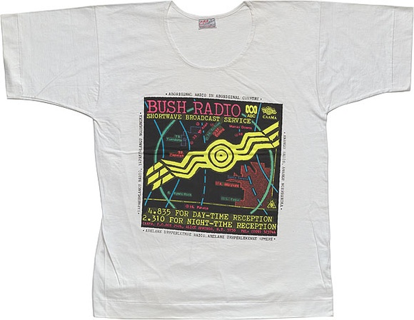 Artist: REDBACK GRAPHIX | Title: T-shirt: Bush Radio. | Date: 1986 | Technique: screenprint, printed in colour, from four stencils | Copyright: © Michael Callaghan, Redback Graphix