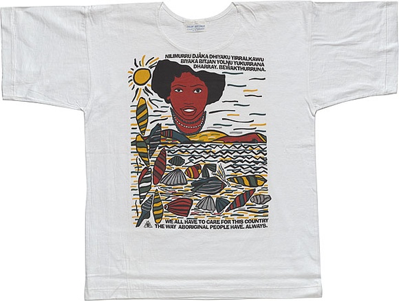 Artist: b'REDBACK GRAPHIX' | Title: b'T-shirt: Nilimurru djaka dhiyaku yirralkawu/ Care for this country' | Date: 1989 | Technique: b'screenprint, printed in colour, from multiple stencils'