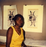 Artist: b'Butler, Roger' | Title: b'Banduk Marika, with her linocut, Djanda and the sacred waterhole, Canberra, 1984' | Date: 1984