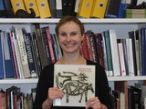 Artist: b'Butler, Roger' | Title: b'Portrait of Melanie Eastburn, holding her book, Papua New Guinea Prints, Canberra, 2006' | Date: 2006