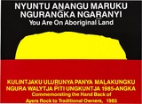 Artist: b'Jalak Graphics.' | Title: b'Nyuntu anangu maruku ngurangka ngaranyi [You are on Aboriginal land]' | Date: 1985 | Technique: b'screenprint, printed in colour, from three stencils'