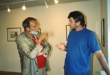 Title: Roy Churcher, artist, and Roger Butler, curator, discussing prints at aGOG gallery, Canberra.