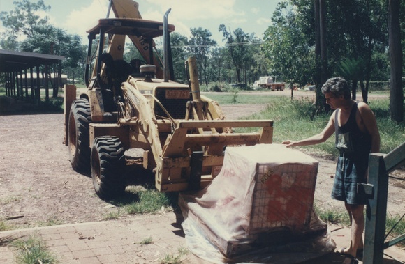 Artist: b'Tremblay, Theo.' | Title: b'Crate of lithographic stones. Adrian Newstead, publisher of the lithographs printed at Studio One, after the Theo Trenblay print workshop, Ramingining, April 1997.' | Date: April 1997