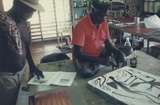 Artist: b'Tremblay, Theo.' | Title: bAndrew Margalulu drawing 'The Journey [to Darwin] on lithographic stone, Theo Trenblay print workshop, Ramingining, April 1997. | Date: April 1997