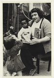 Artist: Lynkushka, Angela. | Title: Postcard: Family day care, homebased child care, long hours, low wages | Date: 1985 | Technique: photo-offset-lithograph | Copyright: © Angela Lynkushka